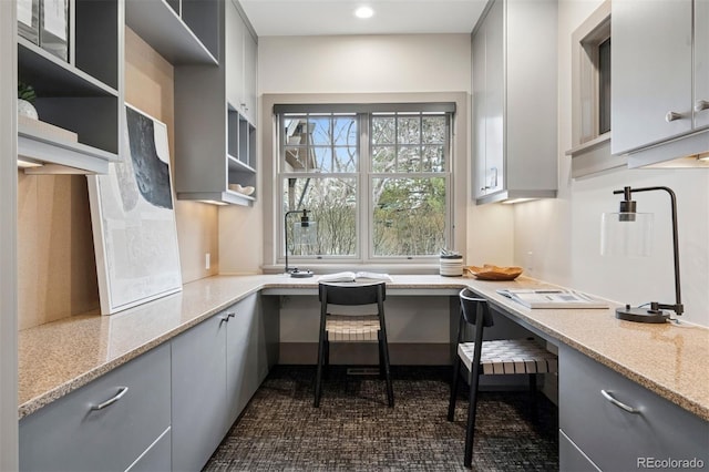 office featuring built in study area and recessed lighting