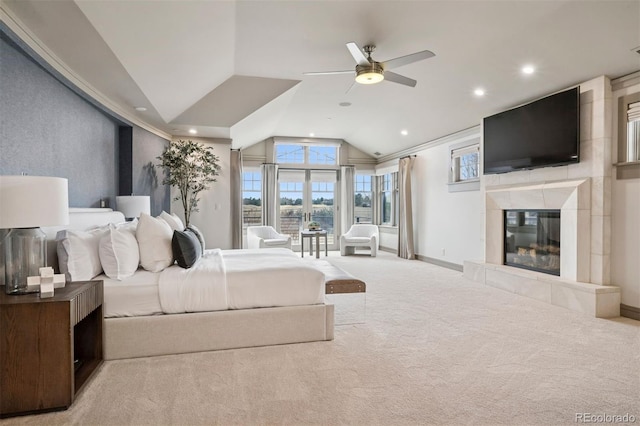 bedroom with baseboards, a tile fireplace, vaulted ceiling, carpet floors, and recessed lighting