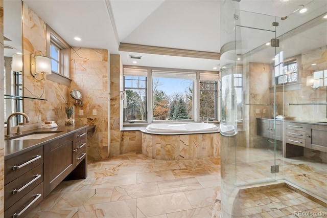 bathroom with marble finish floor, tile walls, a stall shower, vanity, and a bath