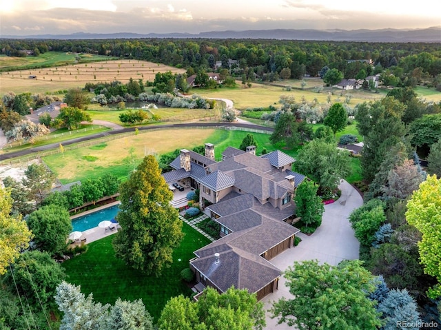 birds eye view of property featuring a rural view