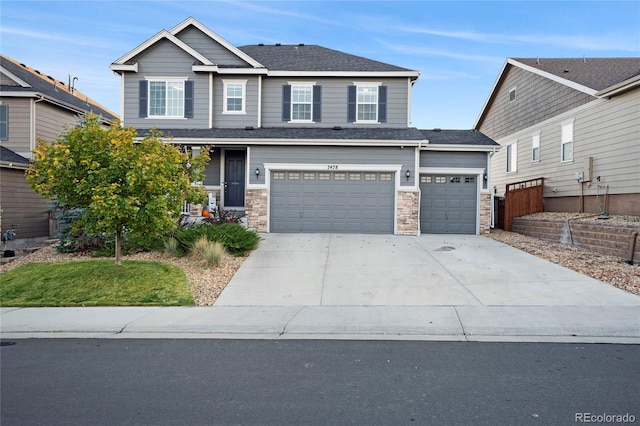 craftsman-style home with a garage