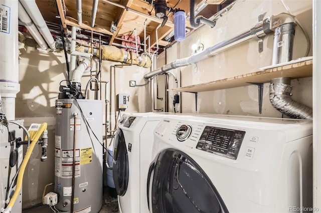 laundry area with washer / clothes dryer, laundry area, and gas water heater