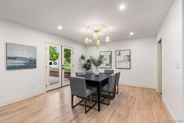 4 Doral Ln, Littleton, CO 80123 - dining room with light wood-type flooring, a chandelier, recessed lighting, and french doors
