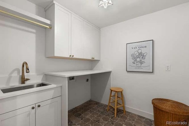 4 Doral Ln, Littleton, CO 80123 - washroom featuring cabinet space and hookup for an electric dryer