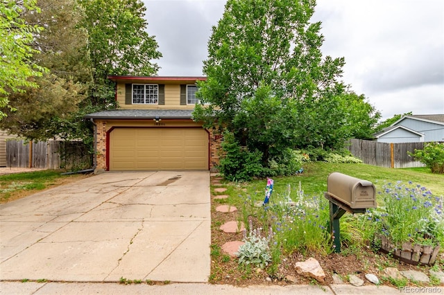 18206 E Loyola Dr, Aurora, CO 80013 - view of front of home with brick siding, a garage, and driveway