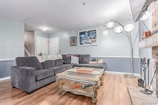 18206 E Loyola Dr, Aurora, CO 80013 - living area featuring wood finished floors and baseboards