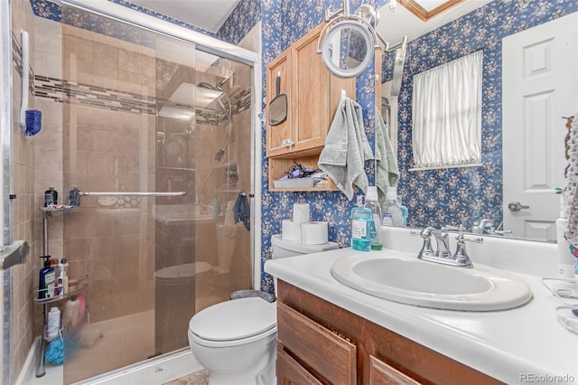 18206 E Loyola Dr, Aurora, CO 80013 - full bathroom with wallpapered walls, vanity, and a shower stall