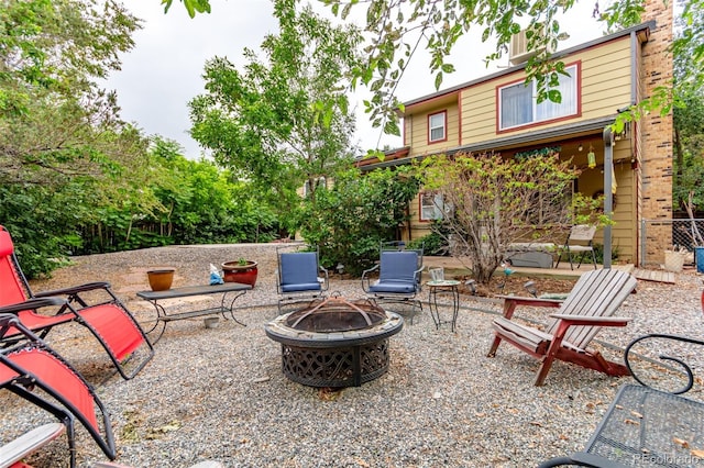 18206 E Loyola Dr, Aurora, CO 80013 - view of patio / terrace featuring a fire pit