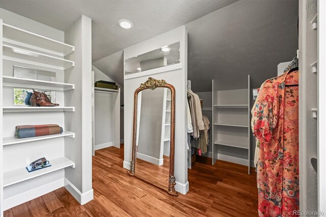 1425 Autumnwood Ln, Evergreen, CO 80439 - spacious closet featuring wood finished floors