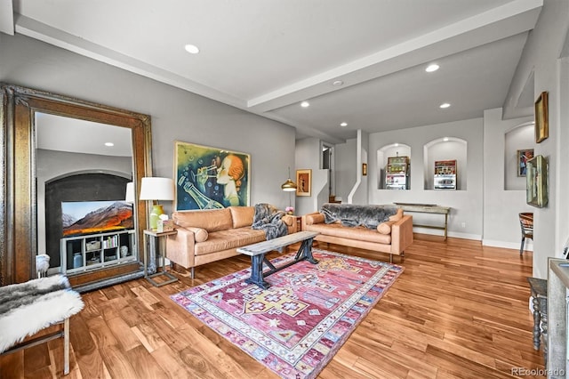 1425 Autumnwood Ln, Evergreen, CO 80439 - living area with light wood-style floors, recessed lighting, stairway, beam ceiling, and baseboards