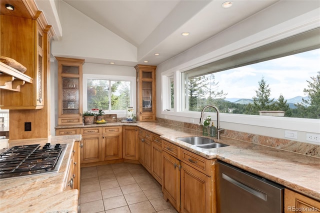 1425 Autumnwood Ln, Evergreen, CO 80439 - kitchen featuring stainless steel appliances, lofted ceiling, light stone counters, light tile patterned floors, and recessed lighting