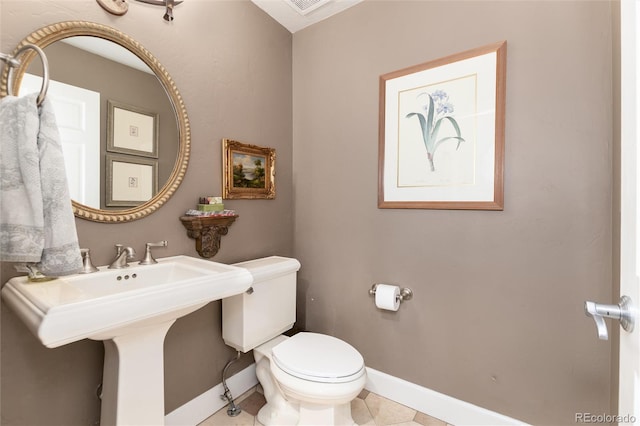 1425 Autumnwood Ln, Evergreen, CO 80439 - half bath featuring toilet and tile patterned floors