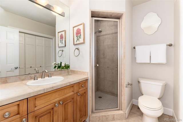 1425 Autumnwood Ln, Evergreen, CO 80439 - bathroom featuring vanity, a stall shower, and tile patterned flooring