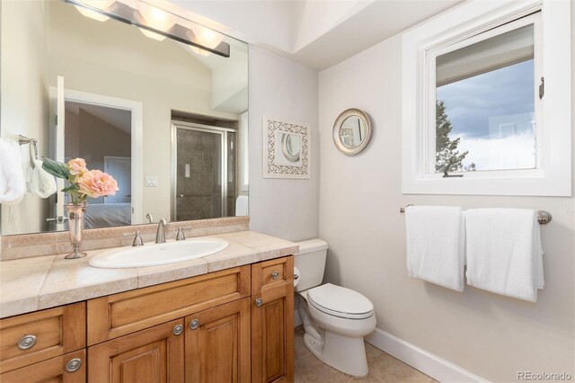 1425 Autumnwood Ln, Evergreen, CO 80439 - bathroom with vanity, a shower stall, and tile patterned flooring