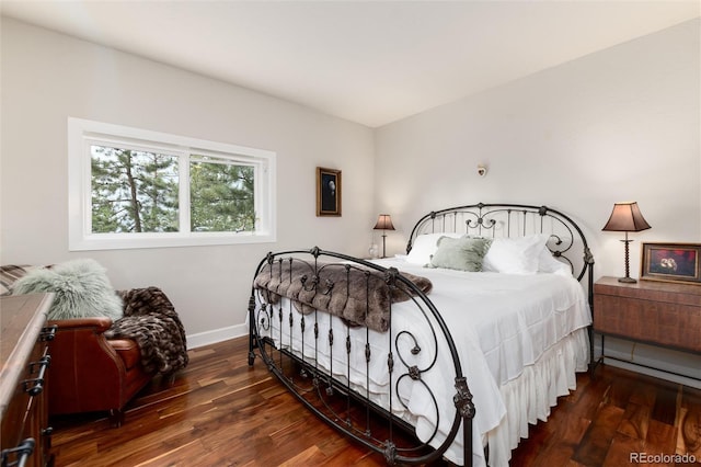 1425 Autumnwood Ln, Evergreen, CO 80439 - bedroom featuring wood finished floors