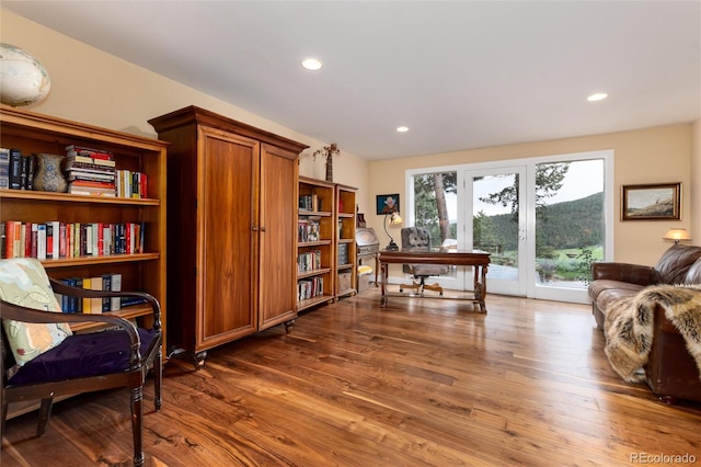 1425 Autumnwood Ln, Evergreen, CO 80439 - office area featuring wood finished floors and recessed lighting