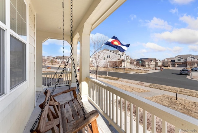 balcony featuring a residential view