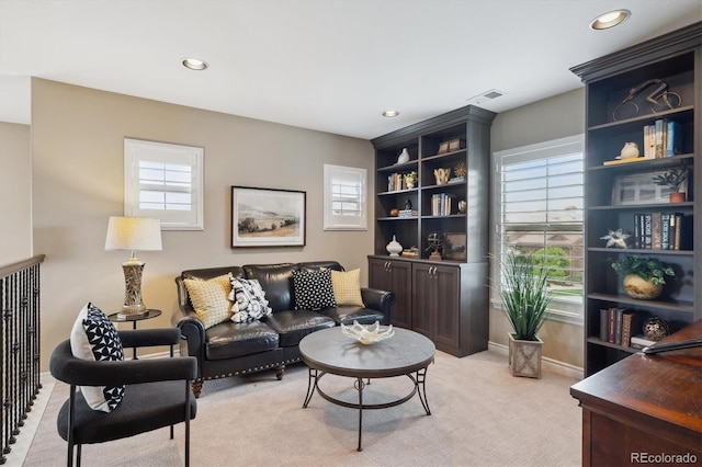 9528 Pendio Ct, Highlands Ranch, CO 80126 - living area with healthy amount of natural light, light colored carpet, recessed lighting, and baseboards