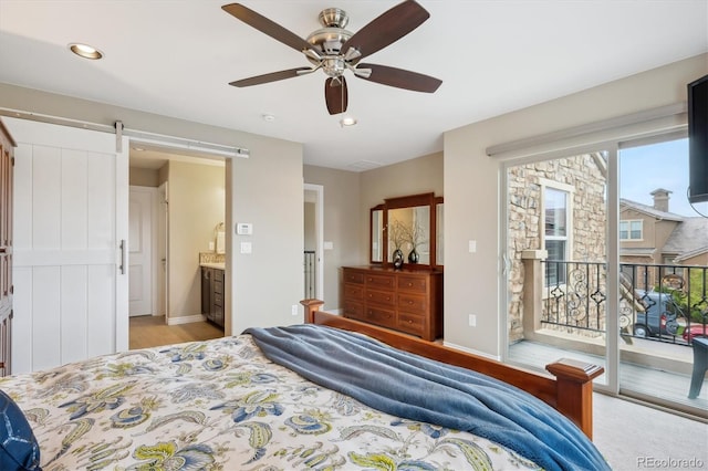 9528 Pendio Ct, Highlands Ranch, CO 80126 - bedroom with access to outside, a barn door, recessed lighting, baseboards, and ceiling fan