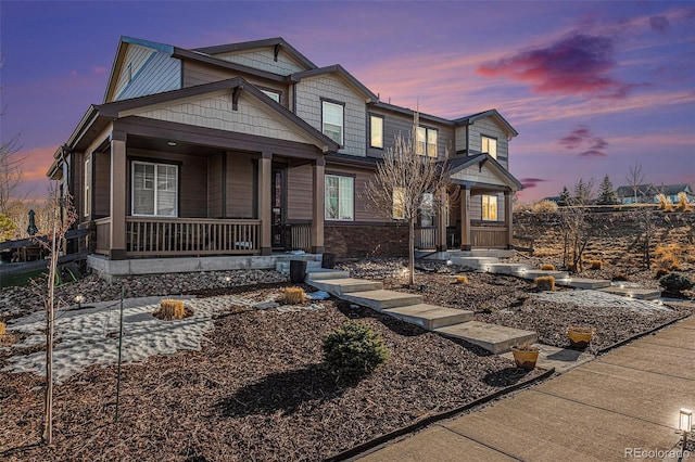 craftsman inspired home with covered porch