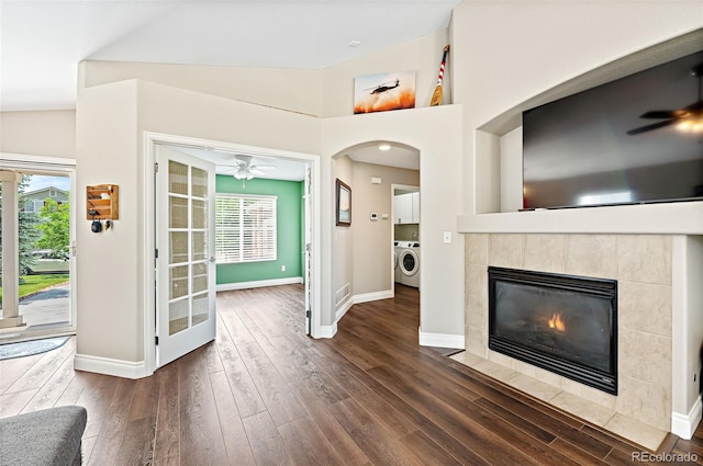 2209 Lupine Pl, Erie, CO 80516 - unfurnished living room featuring washer / dryer, a ceiling fan, healthy amount of natural light, wood finished floors, and lofted ceiling