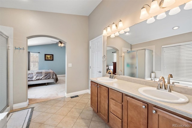 2209 Lupine Pl, Erie, CO 80516 - bathroom with a shower stall, healthy amount of natural light, and lofted ceiling