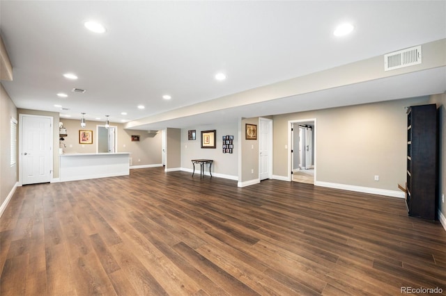 2209 Lupine Pl, Erie, CO 80516 - unfurnished living room with dark wood finished floors and recessed lighting
