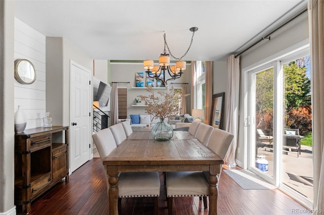 8864 S Field Ct, Littleton, CO 80128 - dining space featuring a chandelier and dark wood-style floors
