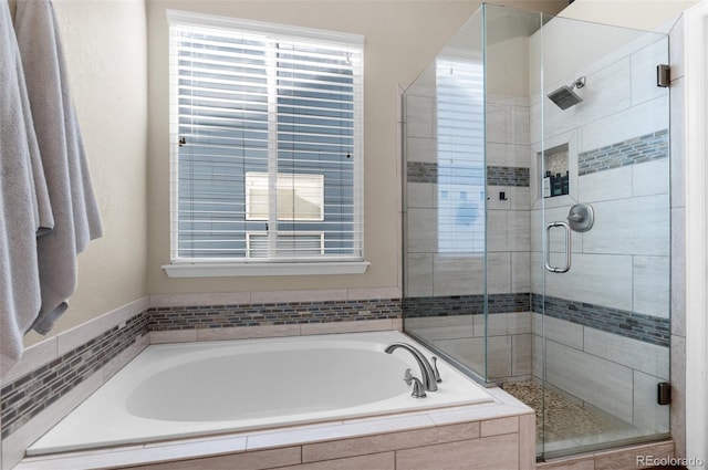 8864 S Field Ct, Littleton, CO 80128 - bathroom featuring a bath and a shower stall
