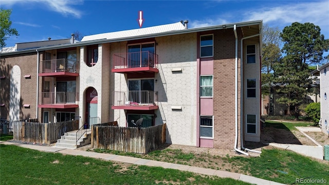 12120 Melody Dr Unit 308, Westminster, CO 80234 - view of apartment building / complex