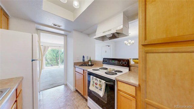12120 Melody Dr Unit 308, Westminster, CO 80234 - kitchen with range with electric cooktop, freestanding refrigerator, light countertops, a chandelier, and under cabinet range hood
