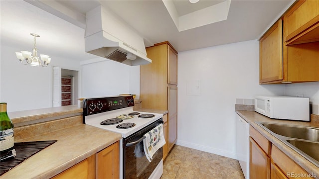 12120 Melody Dr Unit 308, Westminster, CO 80234 - kitchen featuring white appliances, custom exhaust hood, a chandelier, a sink, and light countertops