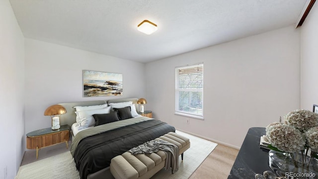 12120 Melody Dr Unit 308, Westminster, CO 80234 - bedroom with light carpet and baseboards