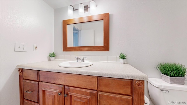 12120 Melody Dr Unit 308, Westminster, CO 80234 - half bath featuring vanity and toilet
