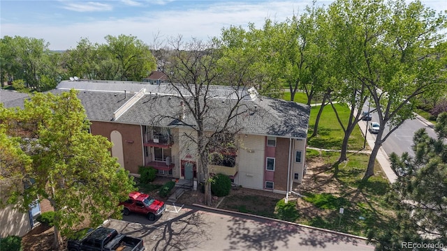 12120 Melody Dr Unit 308, Westminster, CO 80234 - view of front of house with roof with shingles and stucco siding