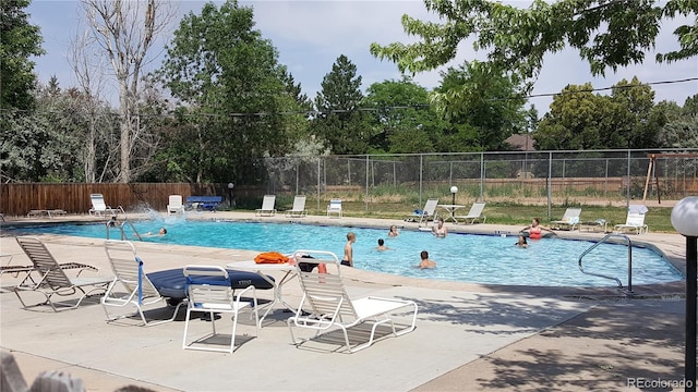 12120 Melody Dr Unit 308, Westminster, CO 80234 - community pool with fence and a patio