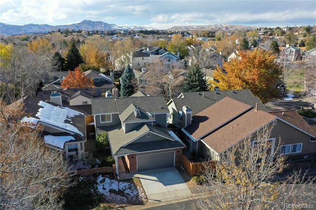 drone / aerial view featuring a mountain view