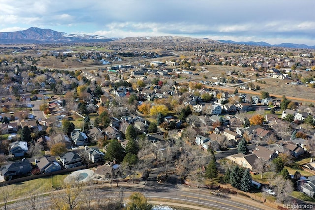 birds eye view of property featuring a mountain view