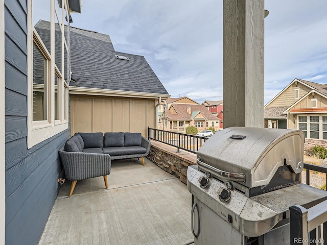 view of patio featuring a grill