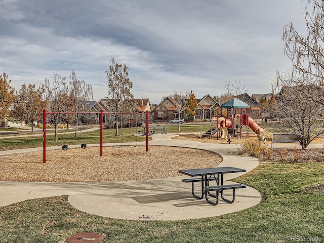 view of play area featuring a lawn