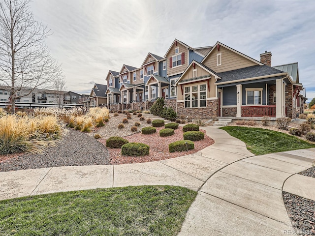 craftsman-style home with covered porch