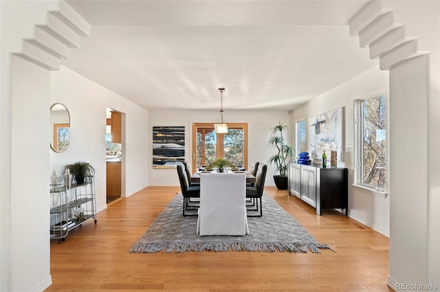 dining room with light wood-type flooring