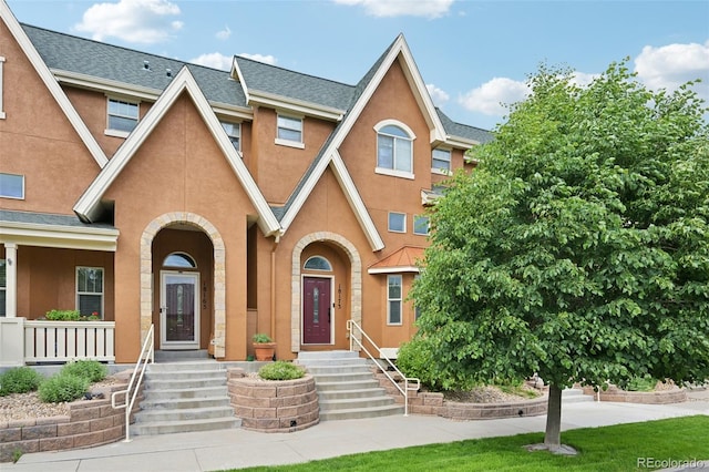 18173 E Saskatoon Pl, Parker, CO 80134 - view of front facade with stucco siding and a shingled roof