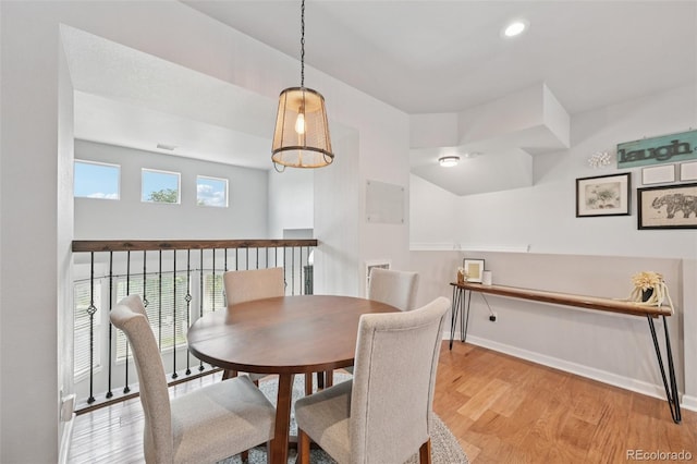 18173 E Saskatoon Pl, Parker, CO 80134 - dining area with wood finished floors and recessed lighting