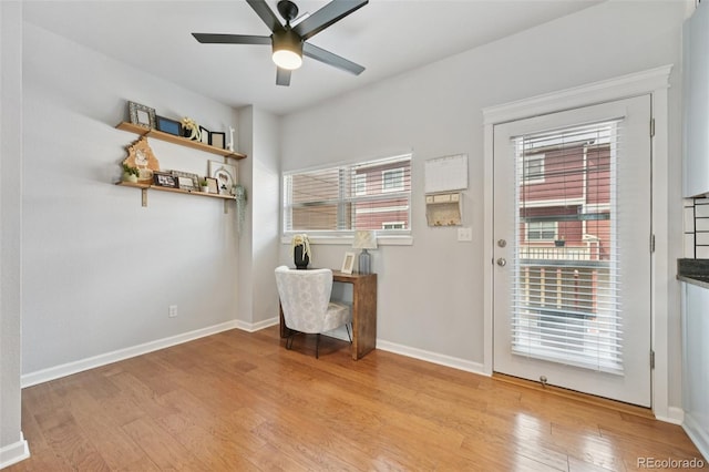 18173 E Saskatoon Pl, Parker, CO 80134 - home office featuring light wood-style floors and ceiling fan