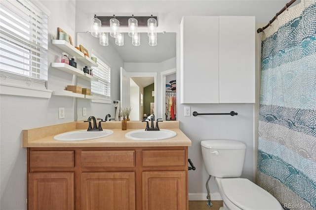 18173 E Saskatoon Pl, Parker, CO 80134 - bathroom featuring double vanity and curtained shower
