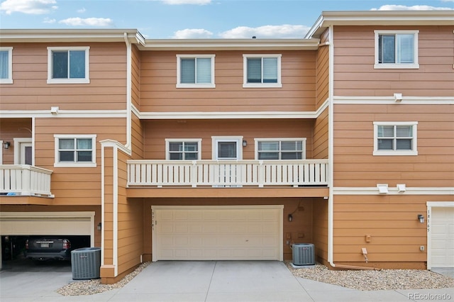 18173 E Saskatoon Pl, Parker, CO 80134 - rear view of house featuring driveway and a garage