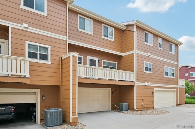 18173 E Saskatoon Pl, Parker, CO 80134 - rear view of property with an attached garage, a balcony, and concrete driveway