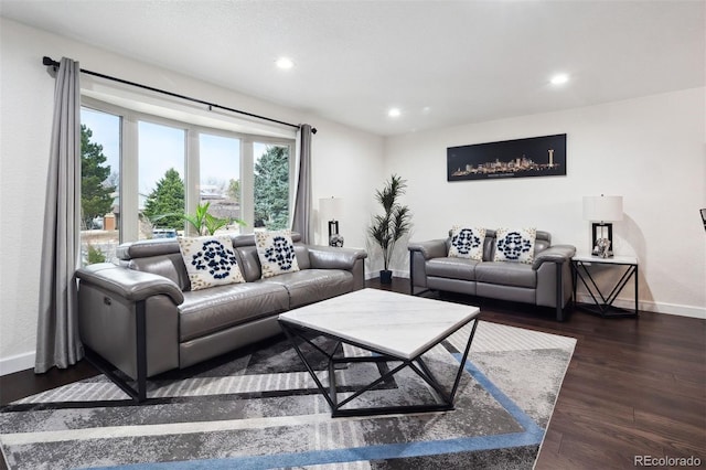 living room featuring recessed lighting, wood finished floors, and baseboards