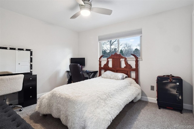 carpeted bedroom featuring ceiling fan and baseboards